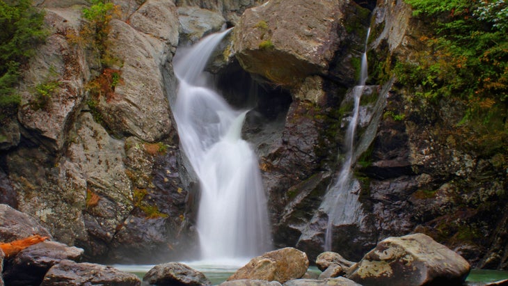 white waterfall over rocks