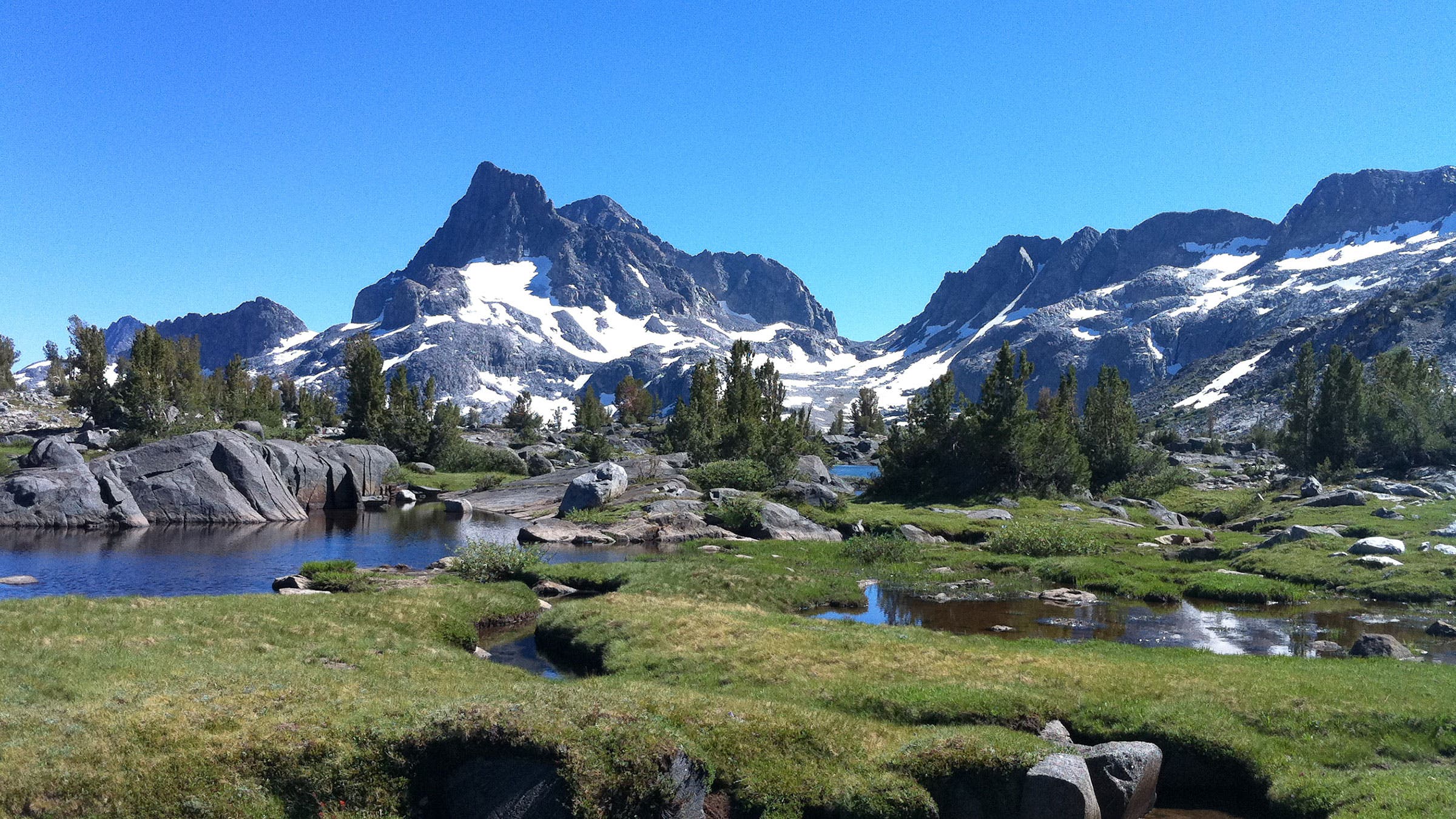 snowy mountains against a blue sky