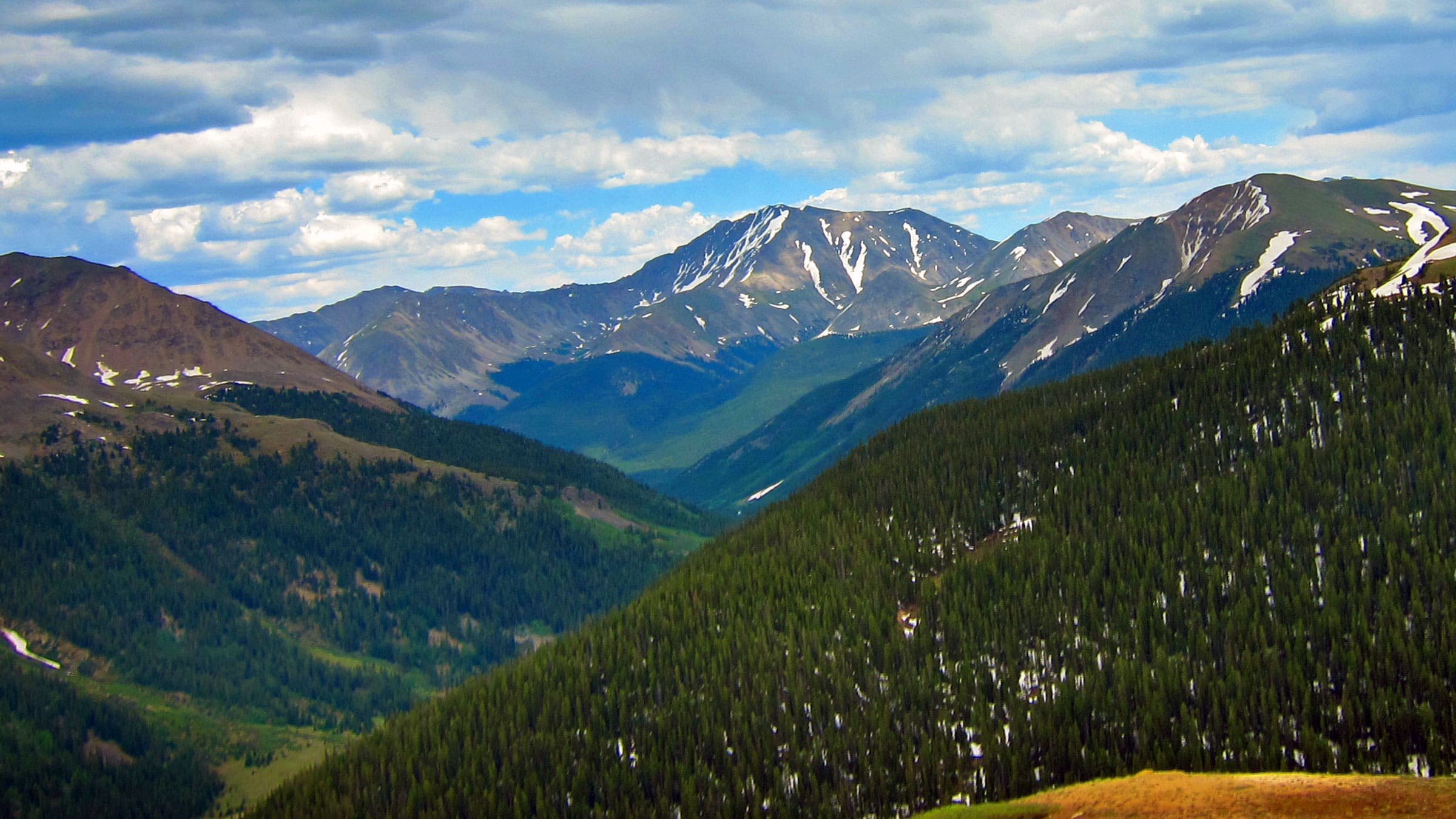 mountains with a bit of snow in the distance