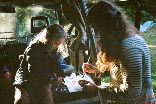 Though the natural world provides a near-endless distraction for the kids, Ryan and Christina have devised other activities to occupy them in quiet moments. Anela loves to paint, and the art materials can be easily stowed away when they’re on the road.