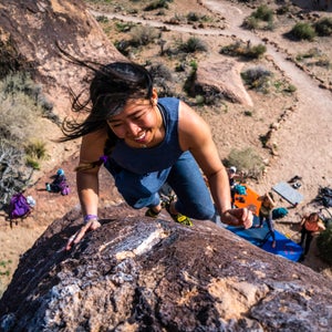A climber topping out her route at the 2019 Women's Climbing Fest