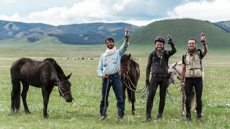 From Left: The author, Campbell Costello, and de Rivaz at the finish.