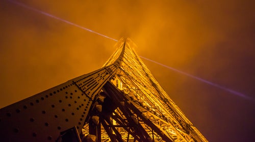 The Eiffel Tower at night.