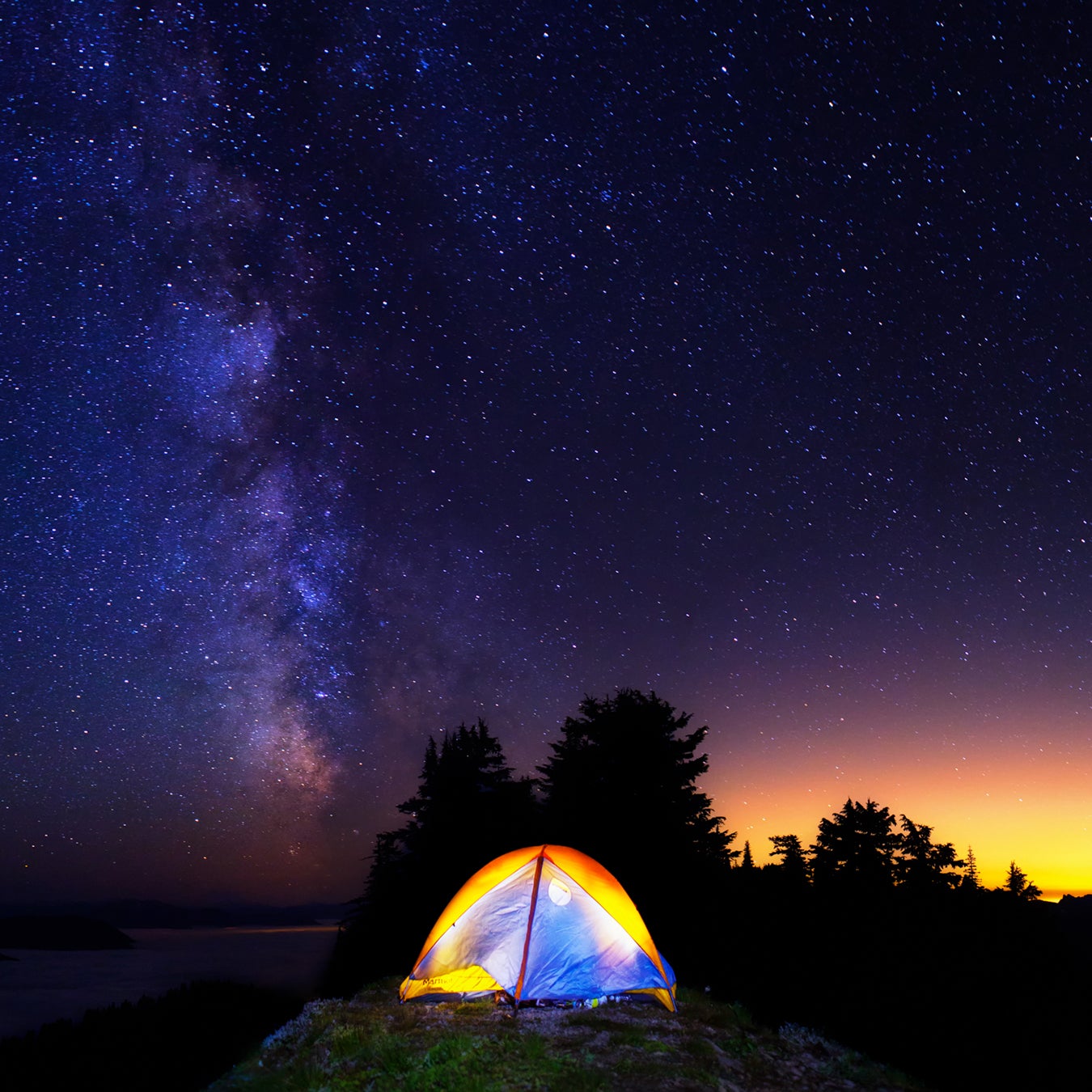 This is a stock photograph of a Ozark Trail brand Camping Lamp on