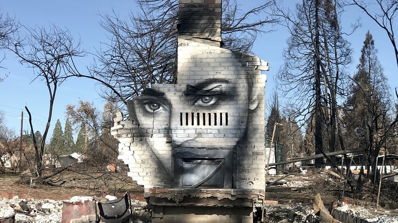Grammer painted a mural on his friend Shane Edwards’s chimney, the only thing remaining of his house.