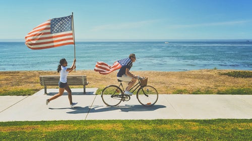 A proud sidewalk cyclist