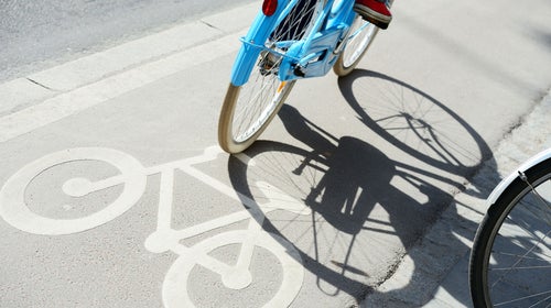Bike lanes make cities safer and better for everyone, including drivers.