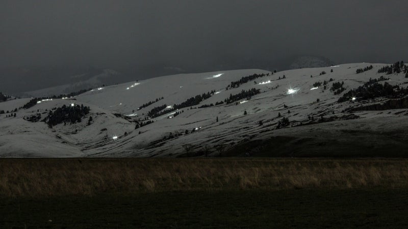 Shed hunters’ headlamps and flashlights dot the foothills just above the National Elk Refuge during the 2018 Jackson Antler Opener