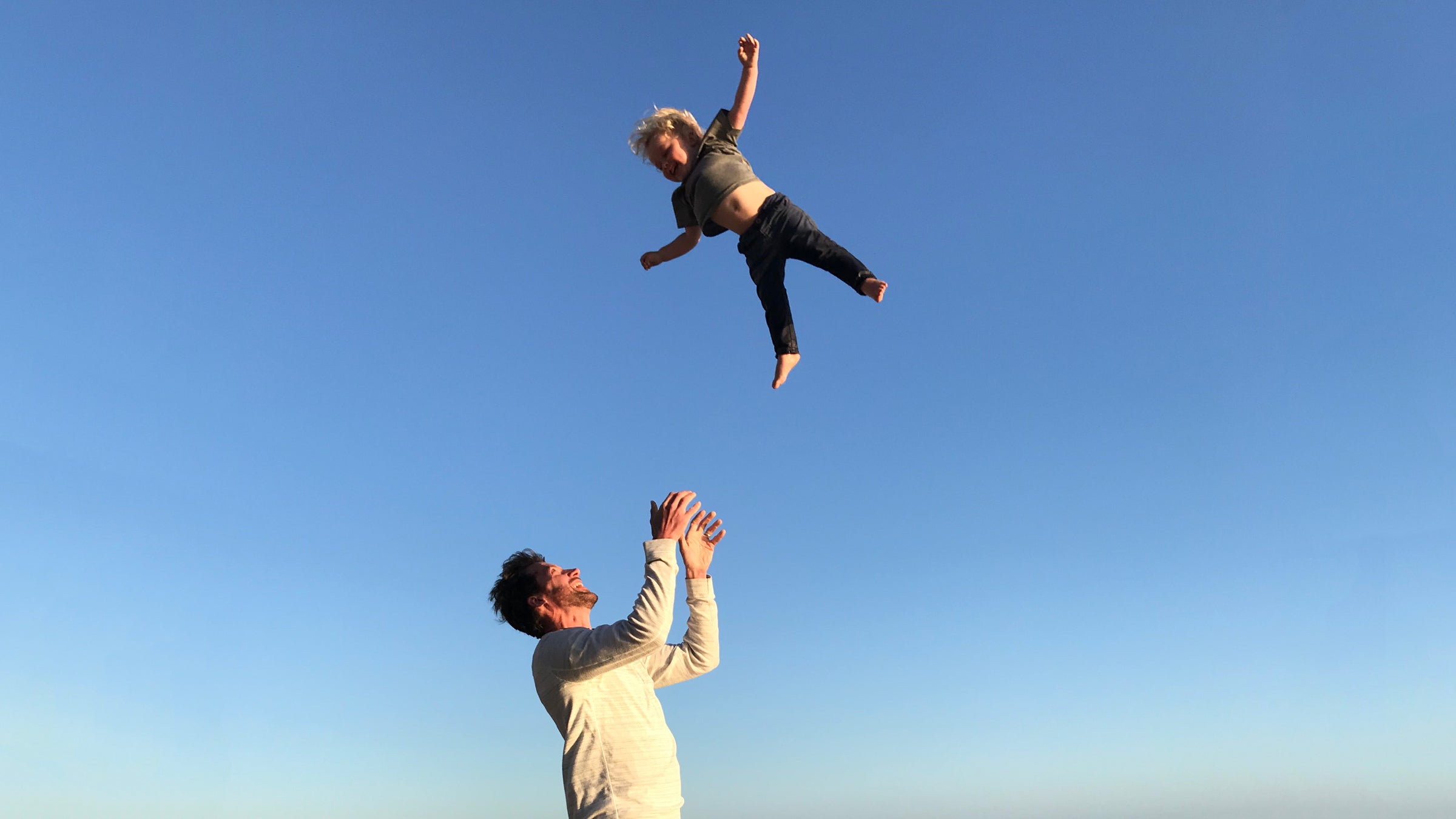 The author and his son in the middle of “working out”