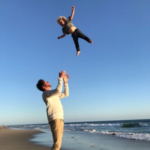 The author and his son in the middle of “working out”