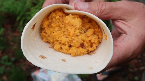 The essential ingredients of the Southwest egg burrito are dehydrated eggs and a tortilla, but it benefits from beans and either fresh or powdered cheese.