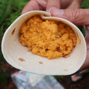 The essential ingredients of the Southwest egg burrito are dehydrated eggs and a tortilla, but it benefits from beans and either fresh or powdered cheese.
