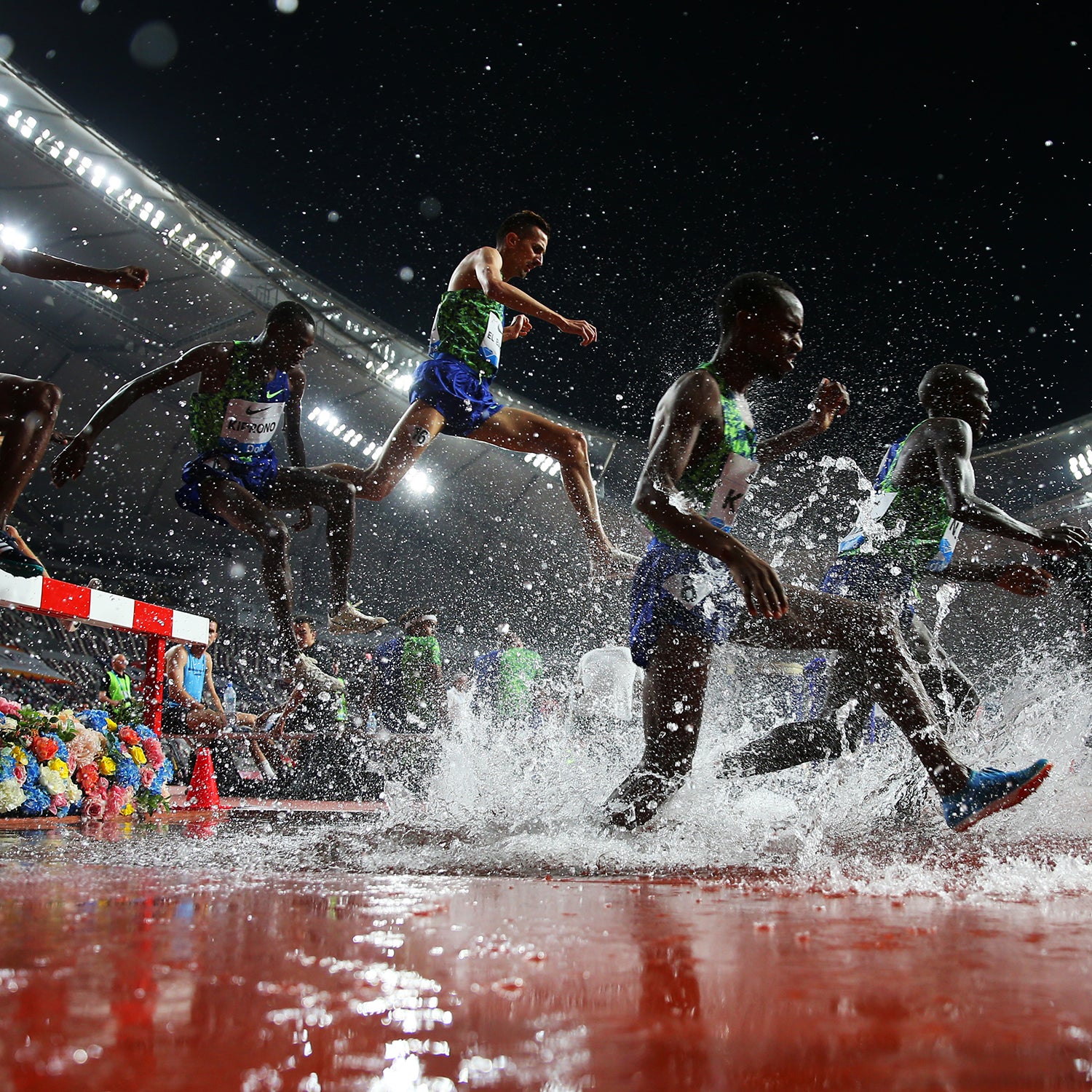 Athletes run the steeplechase during an IAAF event at Khalifa Stadium in Doha, Qatar earlier this year.