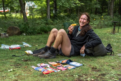 Female hiker and her food
