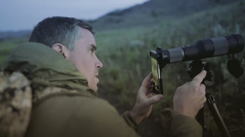 Me, using the Maven S.2 on its Outdoorsmans Compact Tripod to take photos of wildlife in Yellowstone National Park.