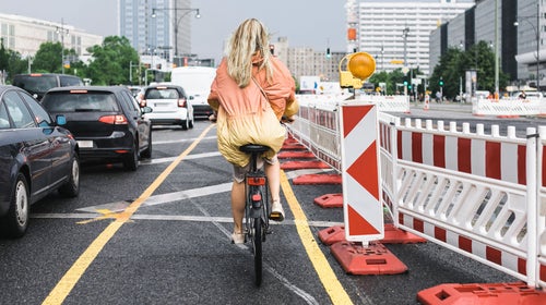 Lady riding on a bike