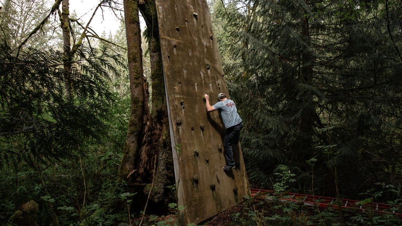 A ReStart alum on the main-campus climbing wall