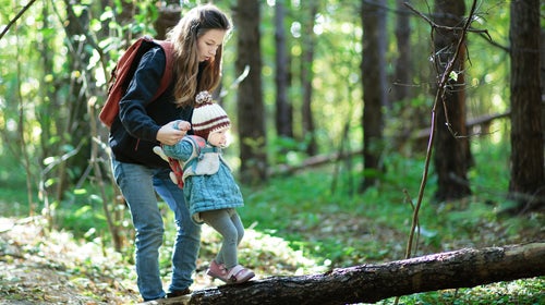 Mom and kid in forest