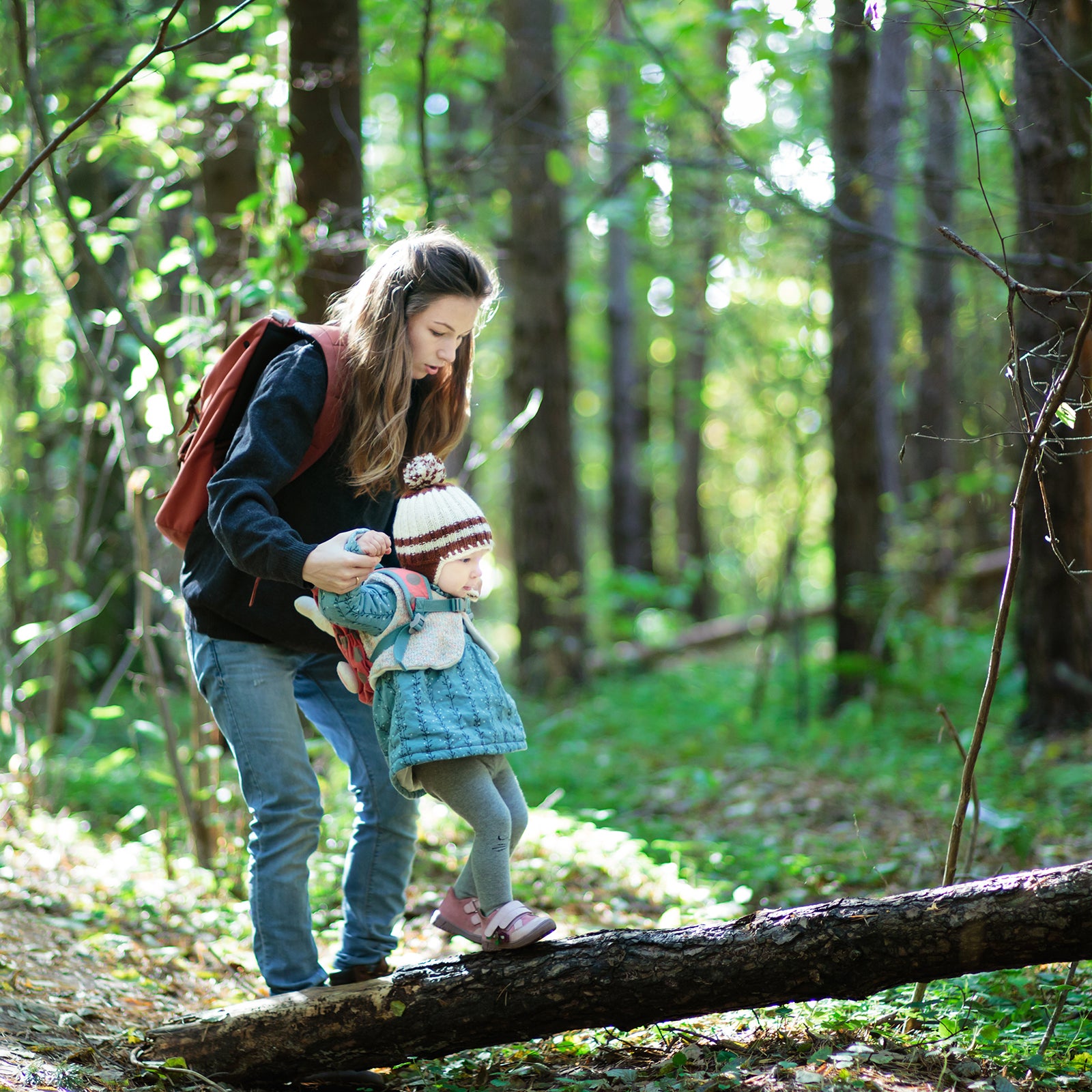 Mom and kid in forest