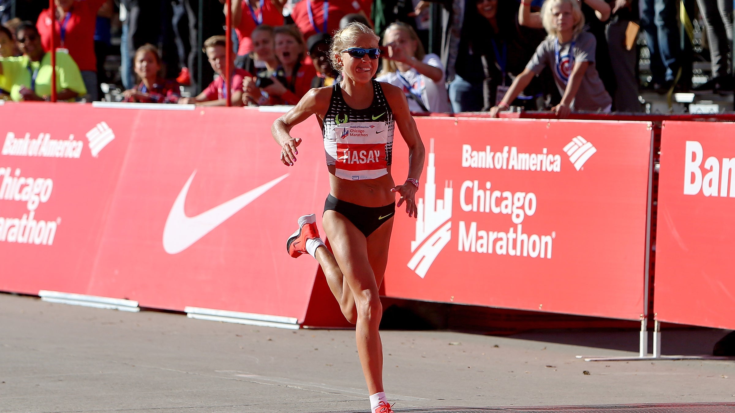 Jordan Hasay winning the Chicago Marathon in 2017. She plans to tackle the race again this weekend, and was coached by Alberto Salazar until last week.