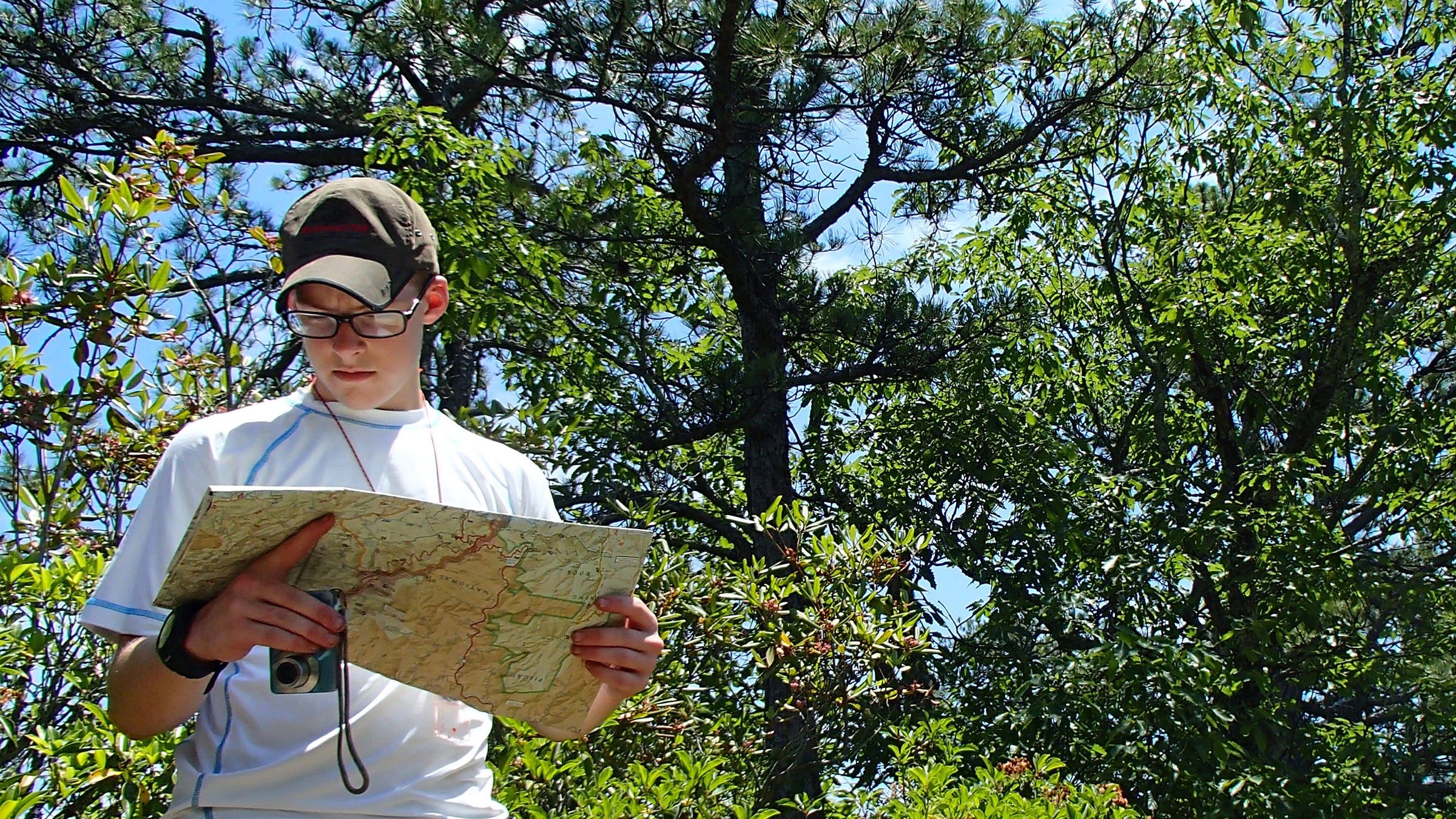 A hiker uses a compass to navigate through the woods. What area of