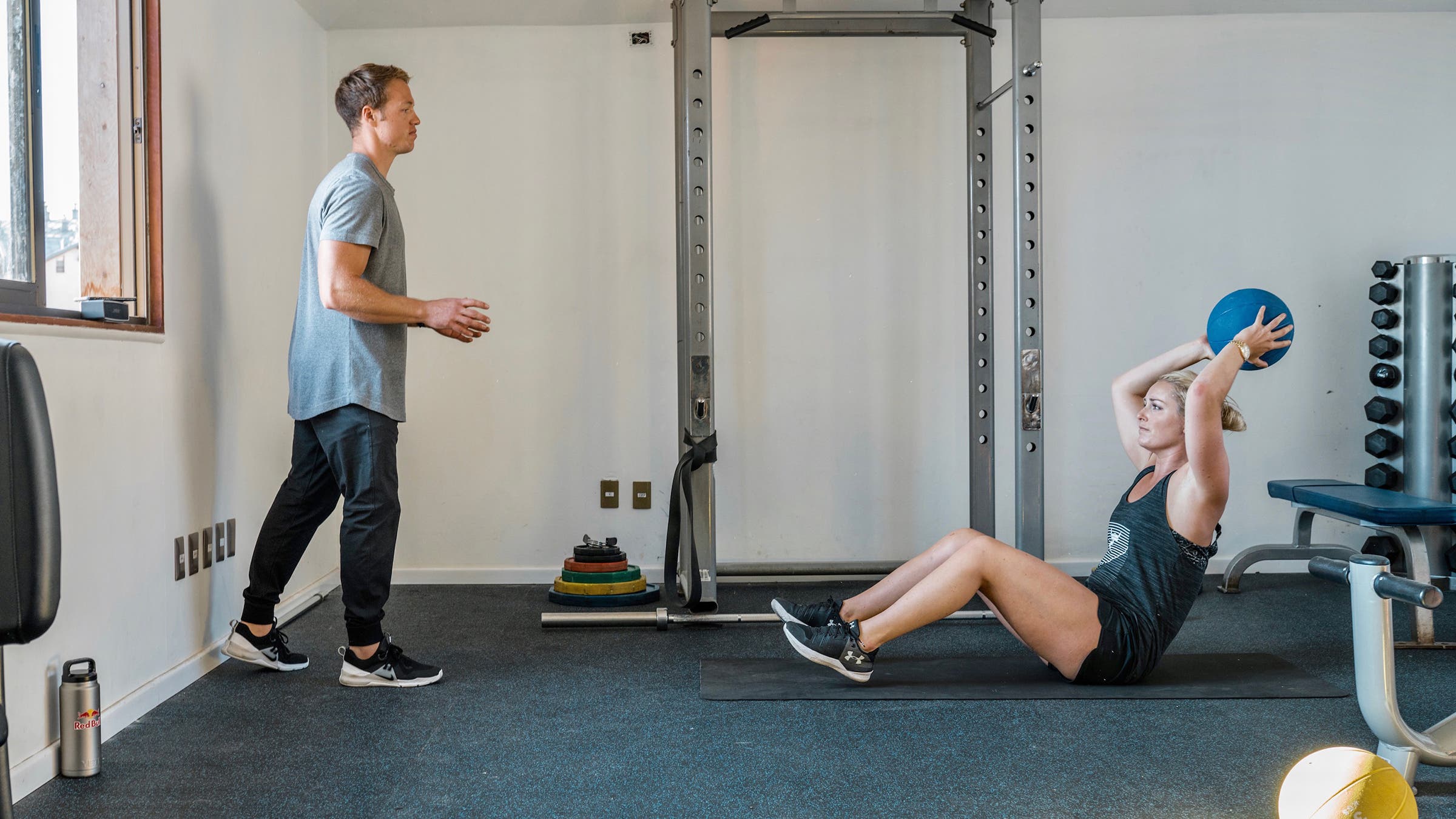 sit ups with a medicine ball during a ski workout