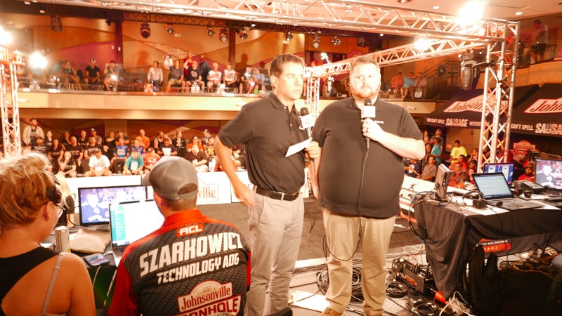 According to cornhole color analyst Trey Ryder (right), pros land about 80 percent of their shots.