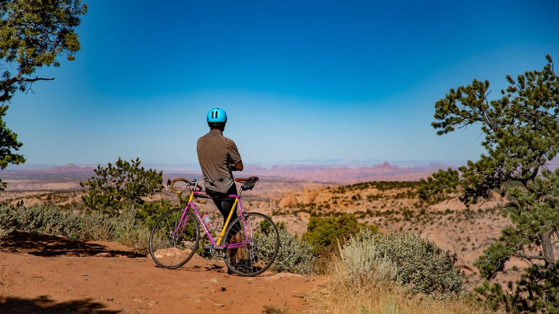Chip Thomas enjoys the view at a canyon near his home outside of Shonto, Arizona.