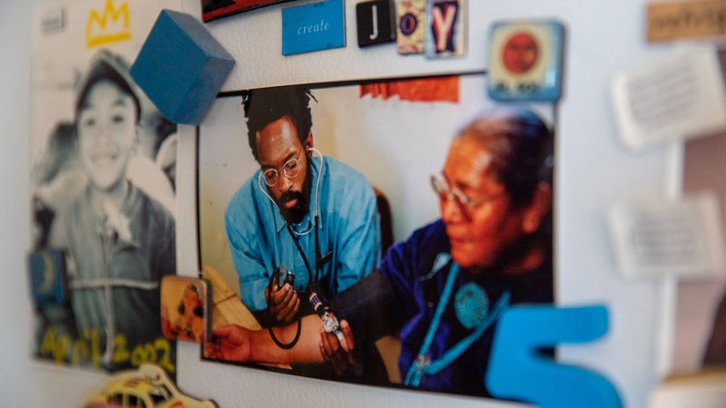 A photo of Chip with one of his patients, taken soon after he moved to the Din茅 Nation in 1981 to fulfill his National Health Service Corps scholarship.