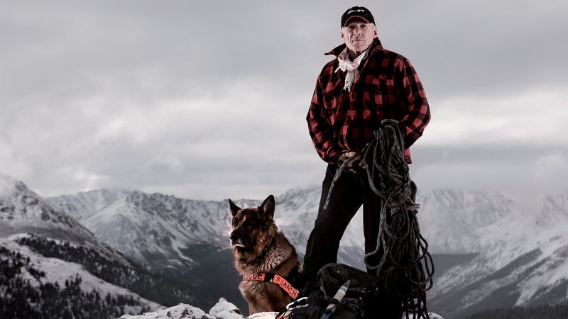 Ferrara with his German Shepherd, Lhotse, at the top of Colorado's Independence Pass