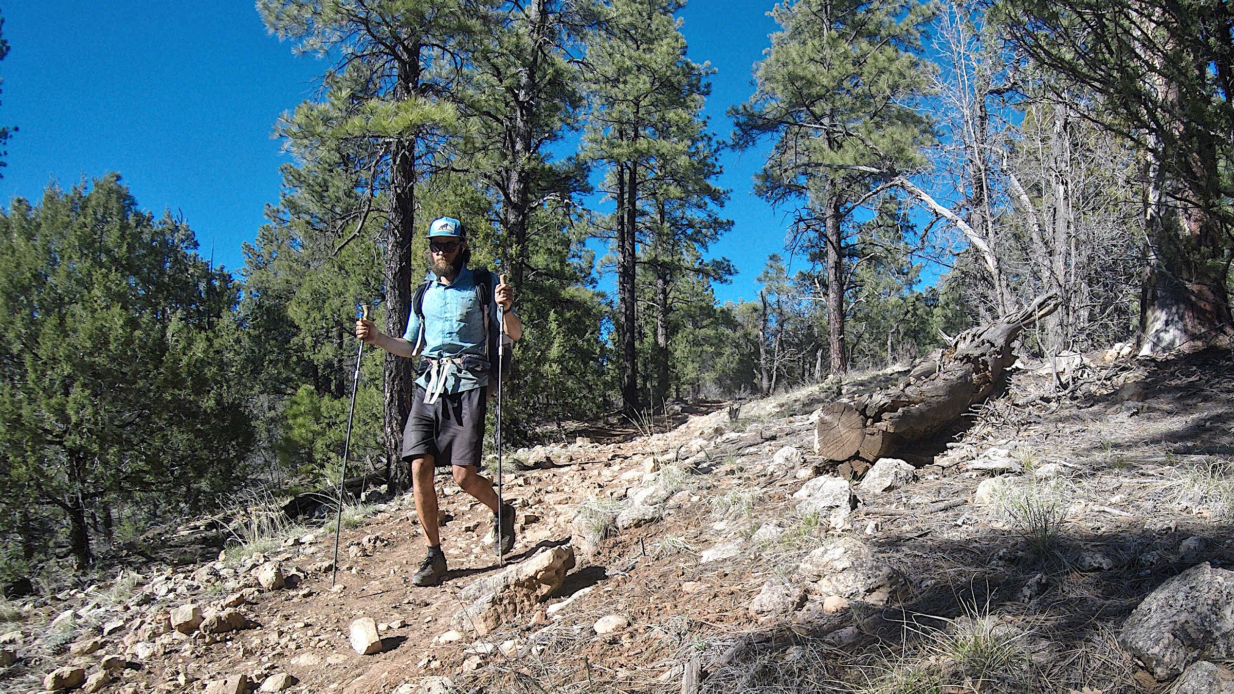 Garmire calls himself a thru-hiker, but he operates at the speed of an Olympian, gracefully running over scree fields and ice chutes, breaking records and accomplishing feats few others can claim.