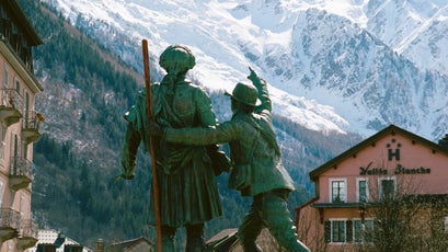Mont Blanc and a statue of Jacques Balmat and Horace Bénédict de Saussure