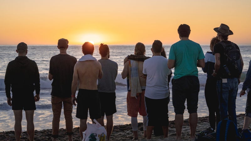 Posner with his friends on Venice Beach in California, the day he completed the walk