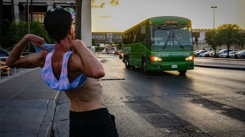 Gates flashes the Green Tortoise bus as evening descends on Las Vegas.