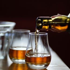 Whisky being poured into a glass