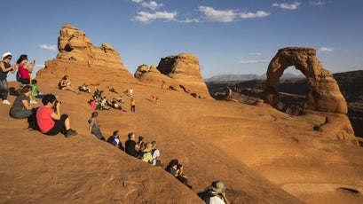 Tourists at Delicate Arch, present day
