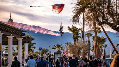 A member of the Red Bull Air Force skydiving team buzzes the crowd before landing at 4xFAR