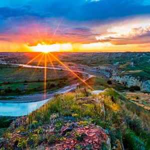 Sunrise over the terrain at North Dakota's Theodore Roosevelt National Park.