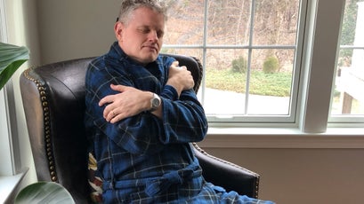 The author in the John Christian Fleece Blue Tartan robe