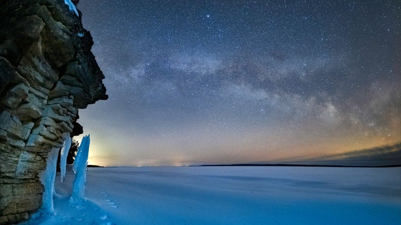 The foreground was lit using the Screen Flashlight app. Peter stood back about 10 feet and used the dimmest setting, which provided ample light for a 15-second exposure. | Camera: Olympus OM-D E-M1 Mark III | Lens: M.Zuiko Digital ED 8mm F1.8 Fisheye PRO | Settings: ISO3200, f/1.8, 15s @ f/1.8