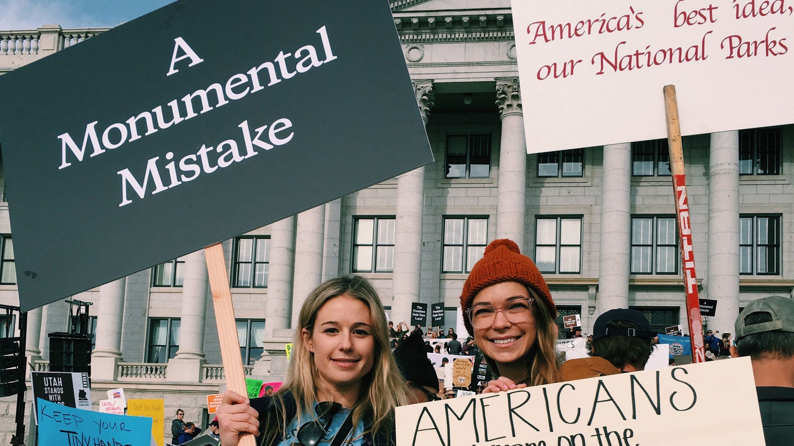 Caroline Gleich and Katie Boué protest the shrinkage of Bears Ears and Grand Staircase-Escalante National Monuments. 