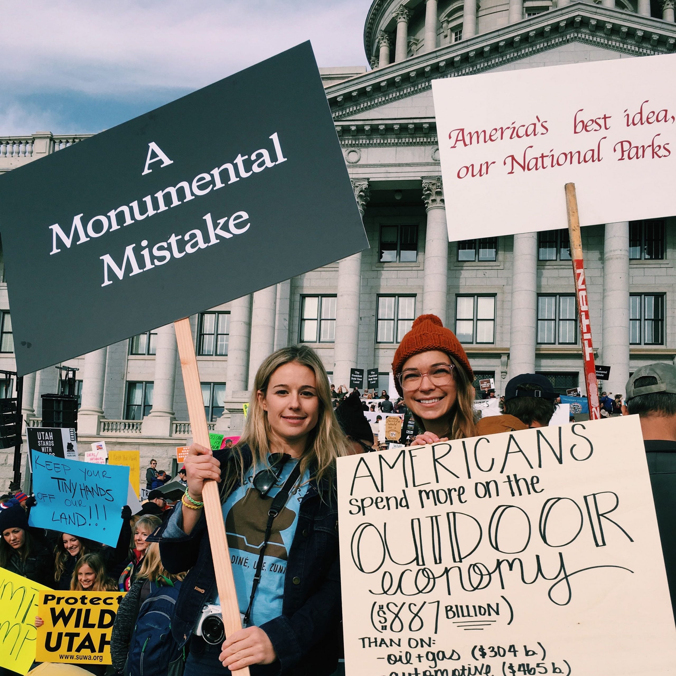 Caroline Gleich and Katie Boué protest the shrinkage of Bears Ears and Grand Staircase-Escalante National Monuments.