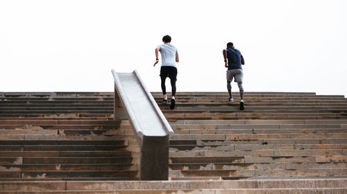 Athletes Training On The Street.