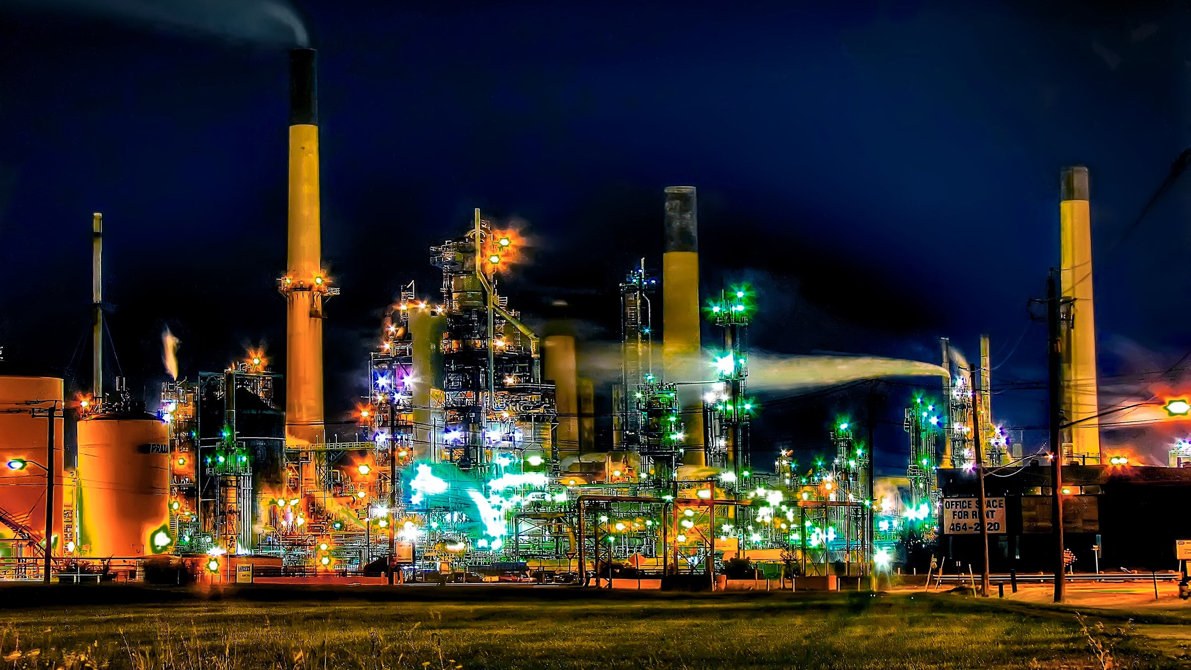 An oil refinery at night. 