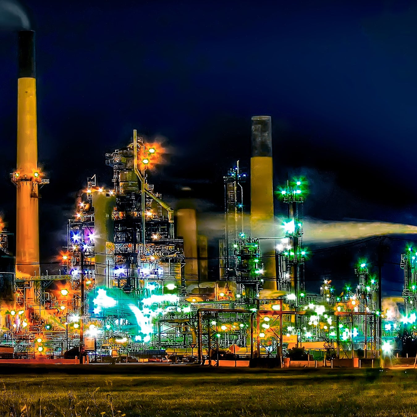 An oil refinery at night.