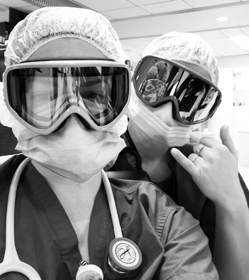 Two health care workers with their goggles at Jacobi Medical Center, located in the Bronx