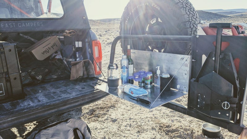 The reality of camping isn鈥檛 often perfectly curated, immaculate campsites. Arrive at night, in the cold, and you鈥檒l typically end up with a scene like this one. The table kept important items out of the way, in a stable, safe place, even in the dark.