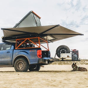 The Equipt Expedition Outfitters 270 awning and Go Fast Campers Platform really combine with the swingout-mounted table to create a cohesive outdoor living area.