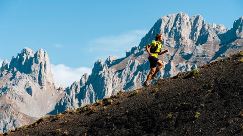 Trail Runner Running Uphill In Collado Jermoso, Leon, Spain