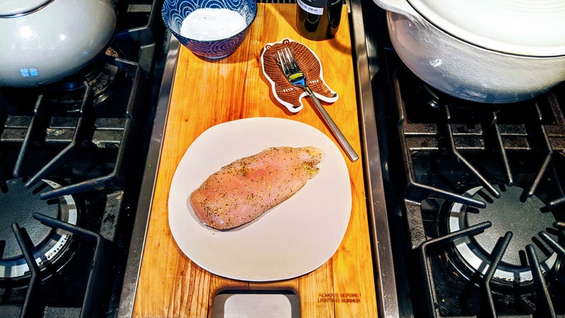 The breast, rubbed all over with kosher salt, black pepper, garlic powder, and olive oil.
